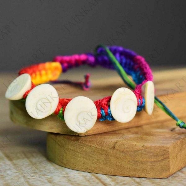 Picture of Multi Color Raksha Potli With Gomti Chakra