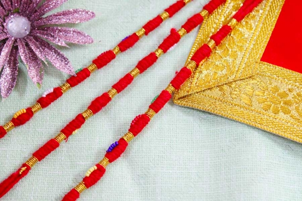 Picture of Raksha Potli With Golden Dhaga