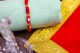 Picture of Raksha Potli With Golden Dhaga