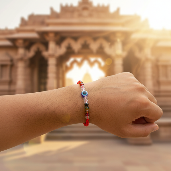 Picture of Crystal Raksha Potli With Nazar Symbol (Color - Red)