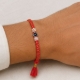 Picture of Red Raksha Potli With Nazar Symbol And White Moti